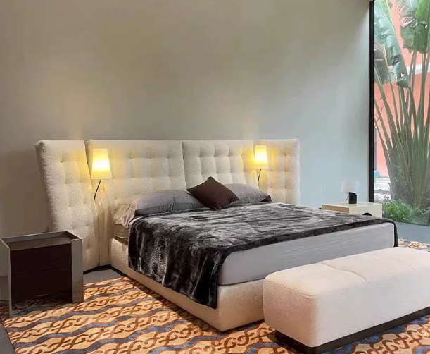 Light Beige Fabric Bed with Tufted Headboard and Reading Lamps