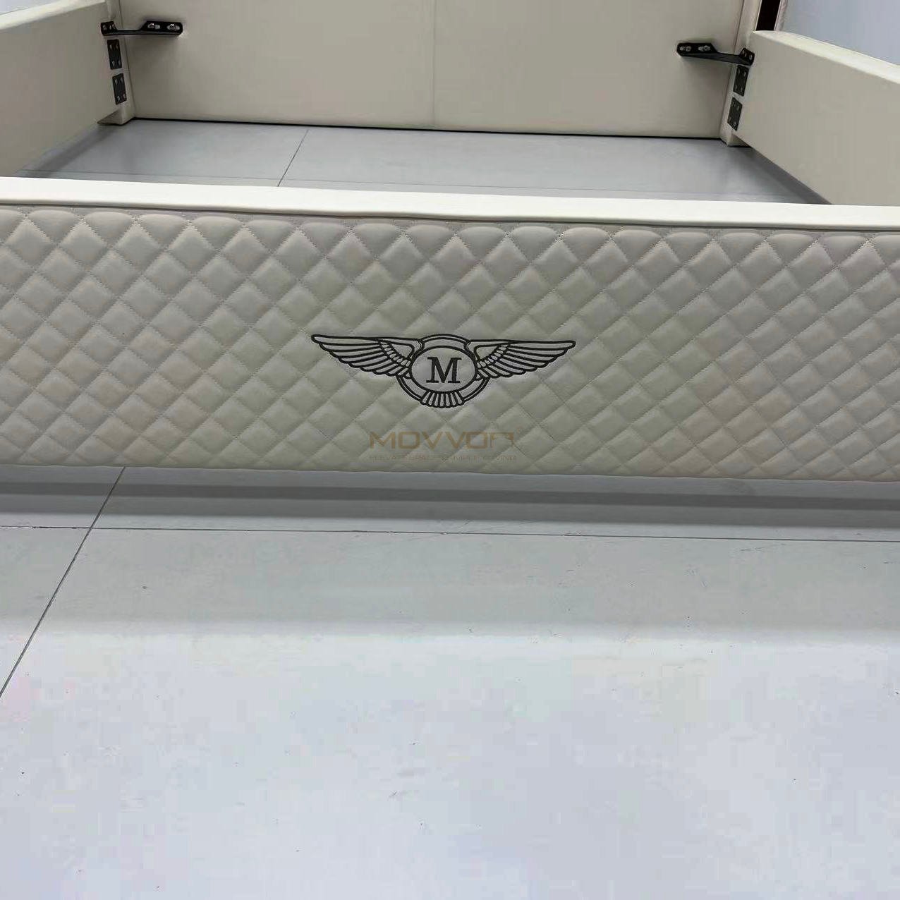 Ivory Quilted Platform Bed with Crest Detail and Side Rails
