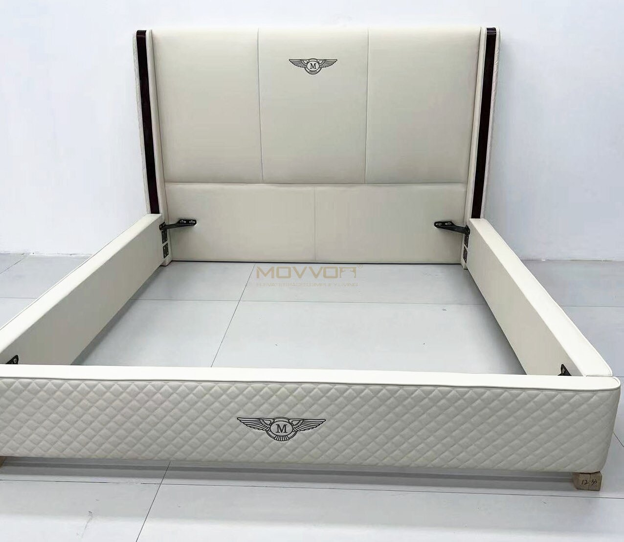 Ivory Quilted Platform Bed with Crest Detail and Side Rails