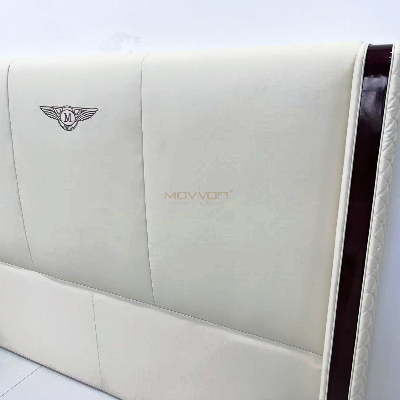 Ivory Quilted Platform Bed with Crest Detail and Side Rails