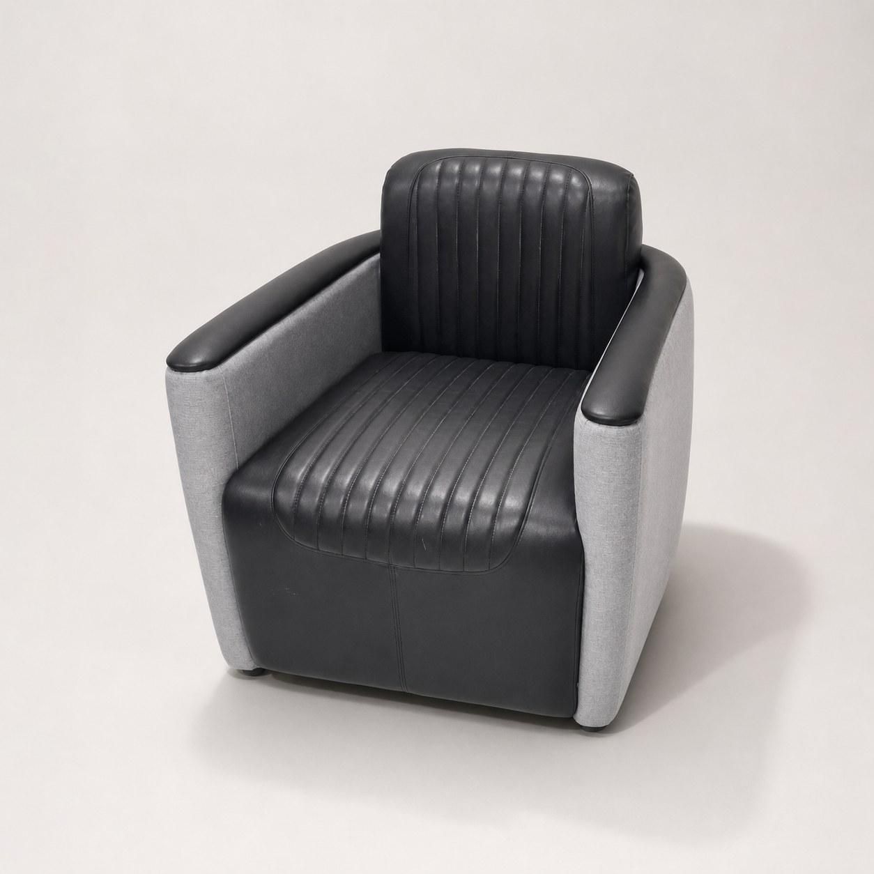 Black Channel-Tufted Tub Chair Wrapped in a Grey Outer Shell