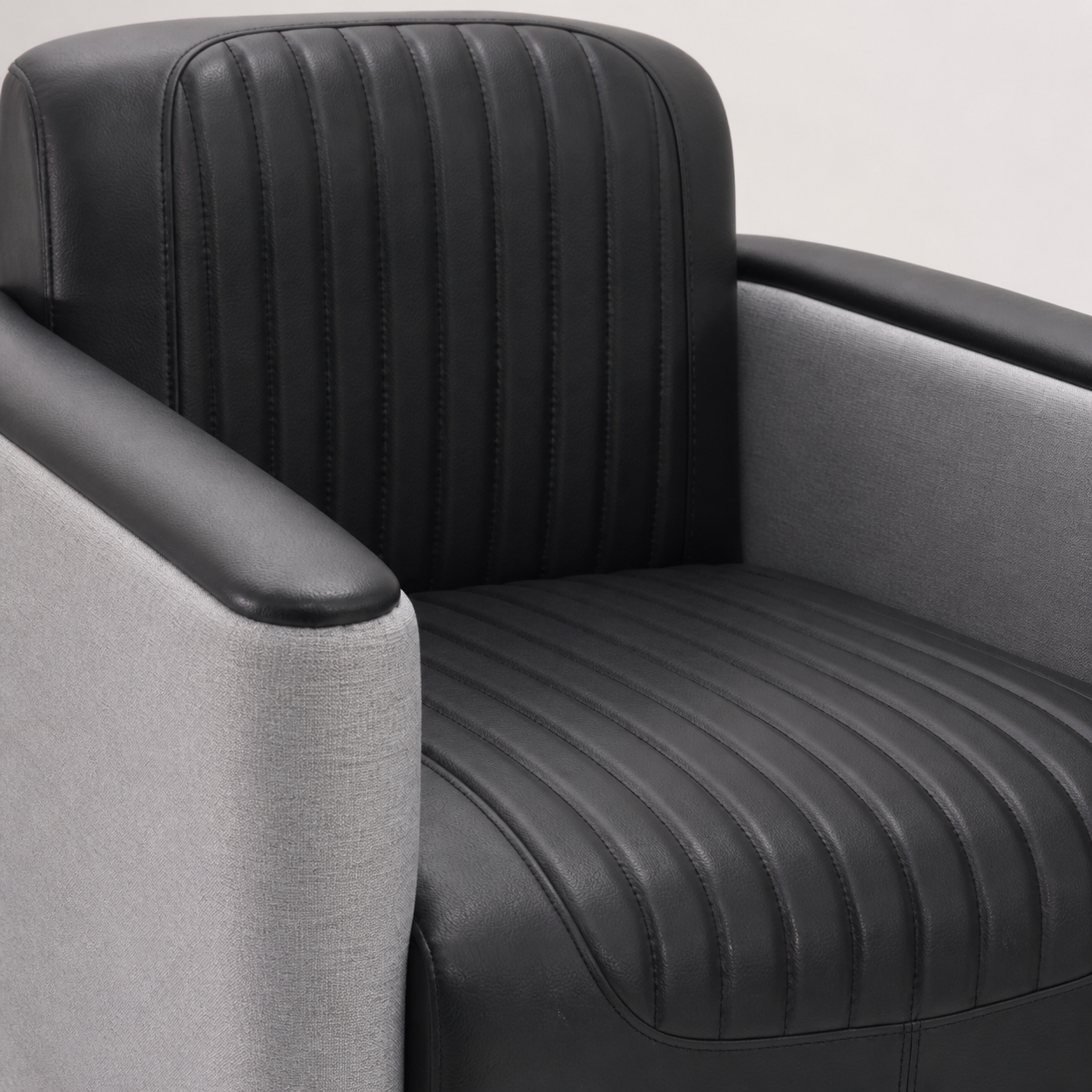 Black Channel-Tufted Tub Chair Wrapped in a Grey Outer Shell