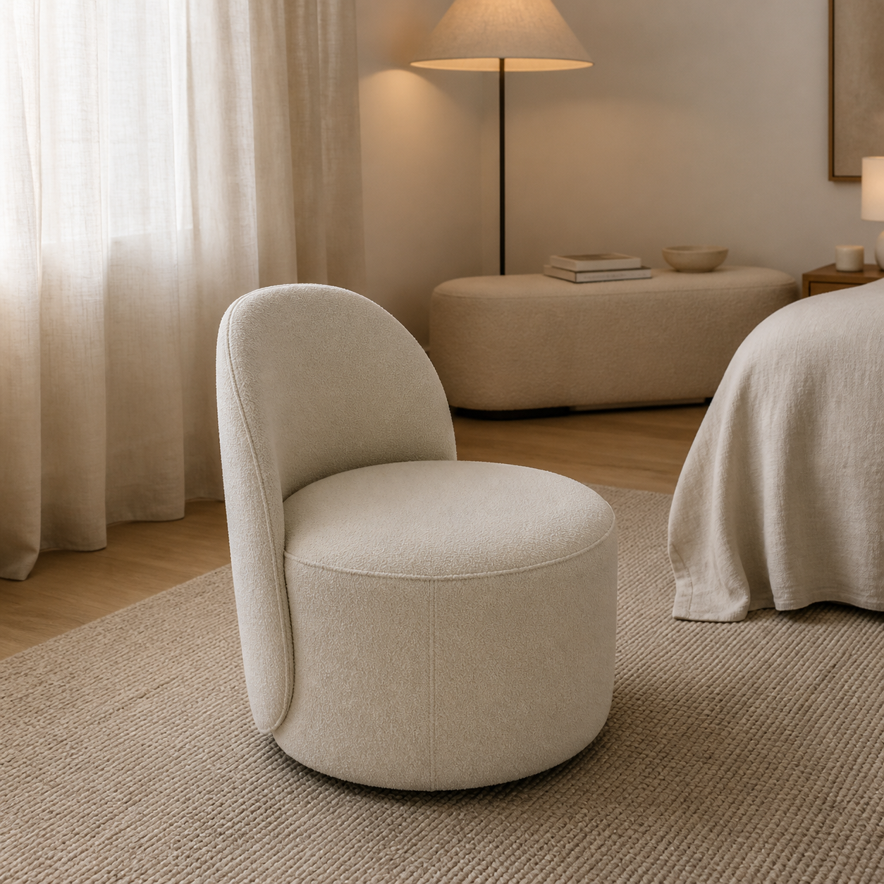 Cream Boucle Barrel Chair with an Arched Back Silhouette