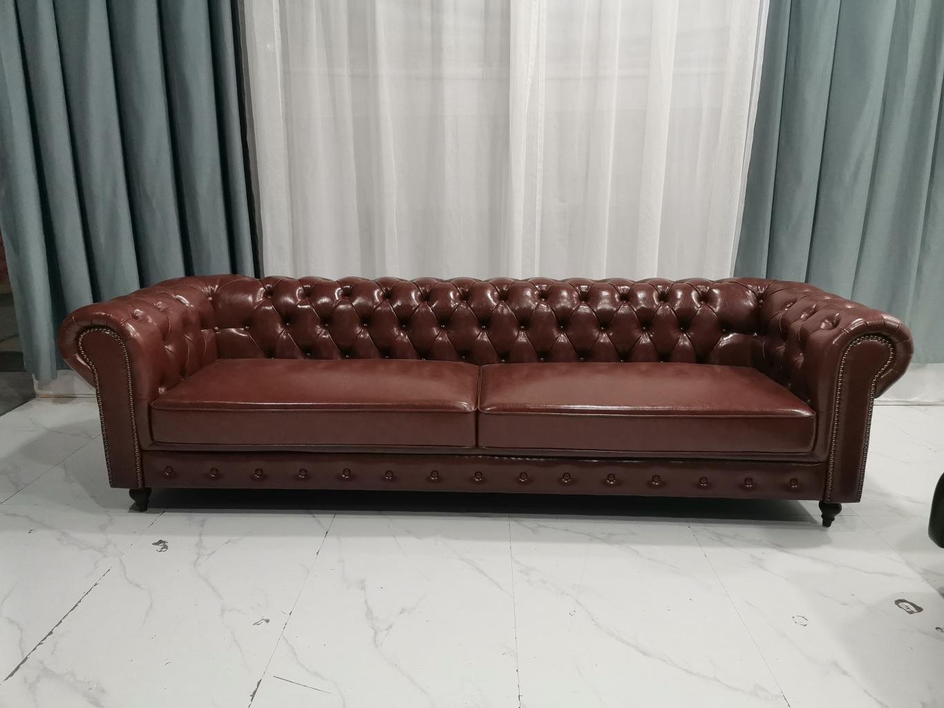 Burgundy Chesterfield Sofa with Deep Tufting and Nailhead Arms