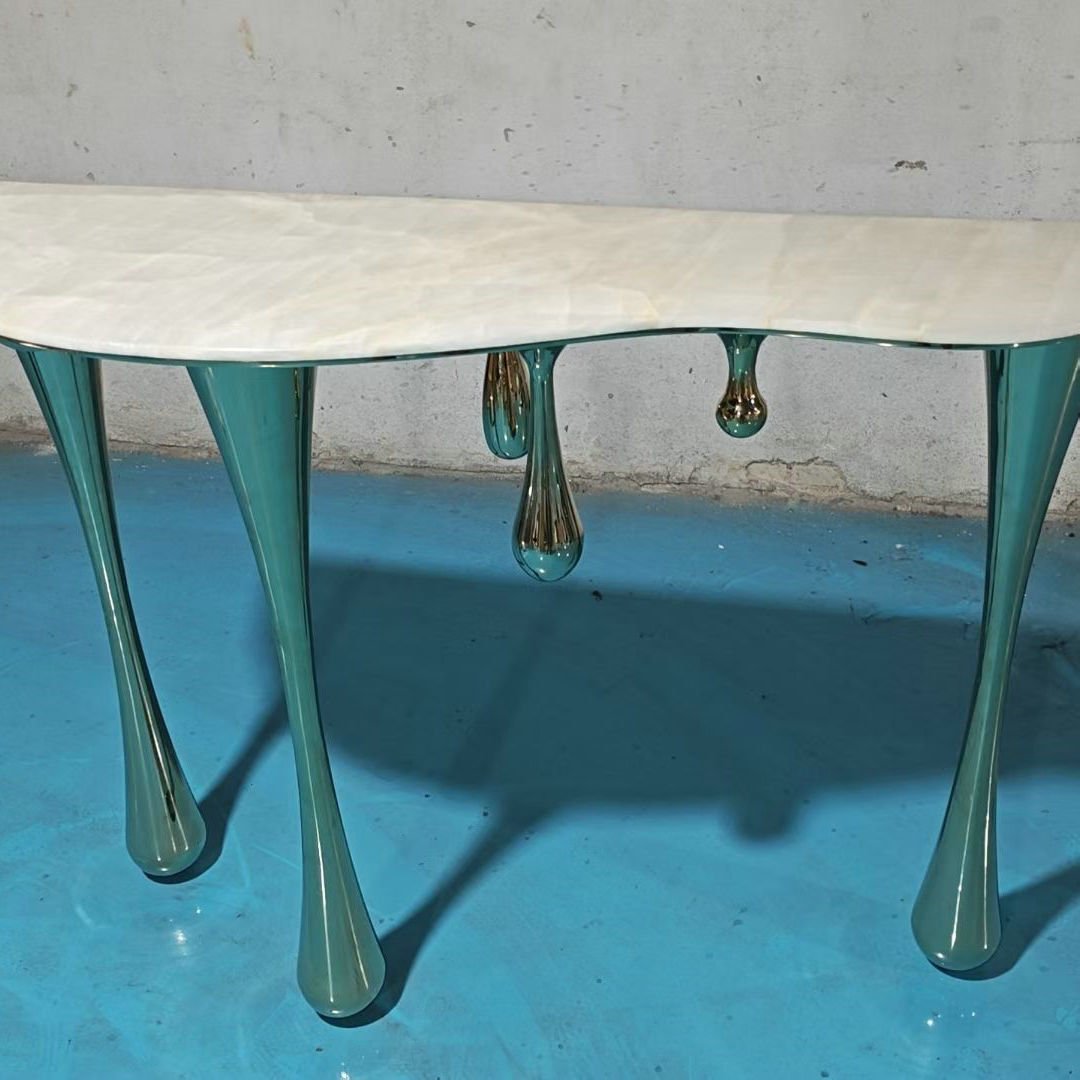 Pearlescent Console Table with Silver Sculptural Legs and Drop Accents
